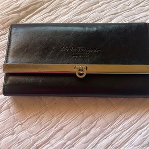Salvatore Ferragamo wallet with checkbook insert. Black